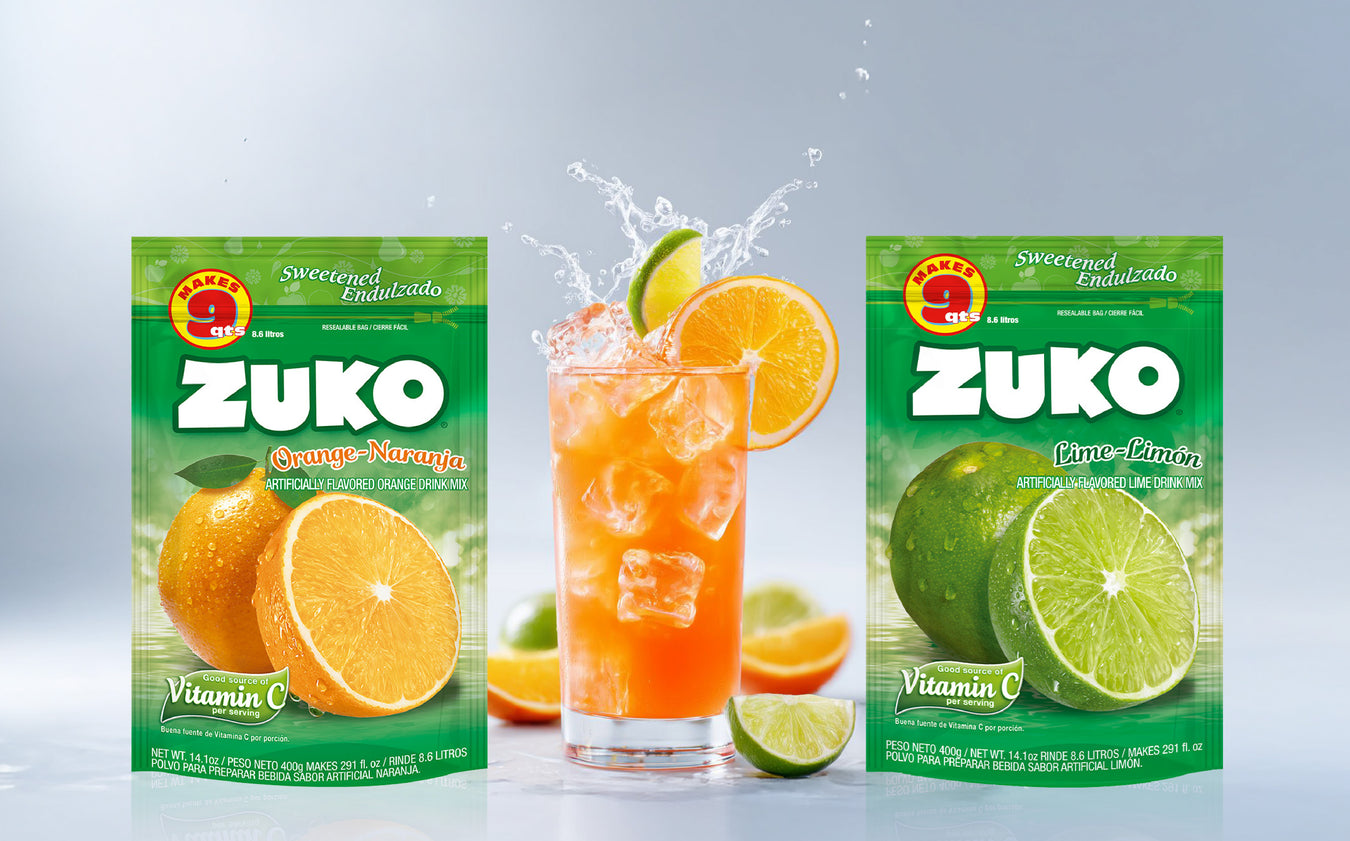 Two packages of Zuko one is orange and the other is lemon with a glass in the middle representing Zuko's freshness